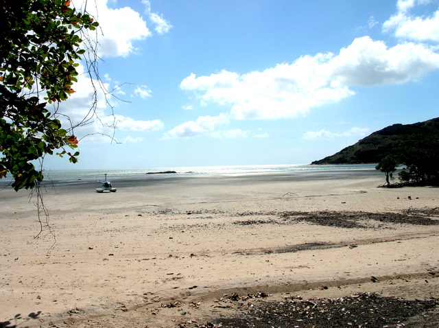 Continuing across sandy beach