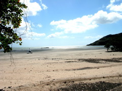 Continuing across sandy beach